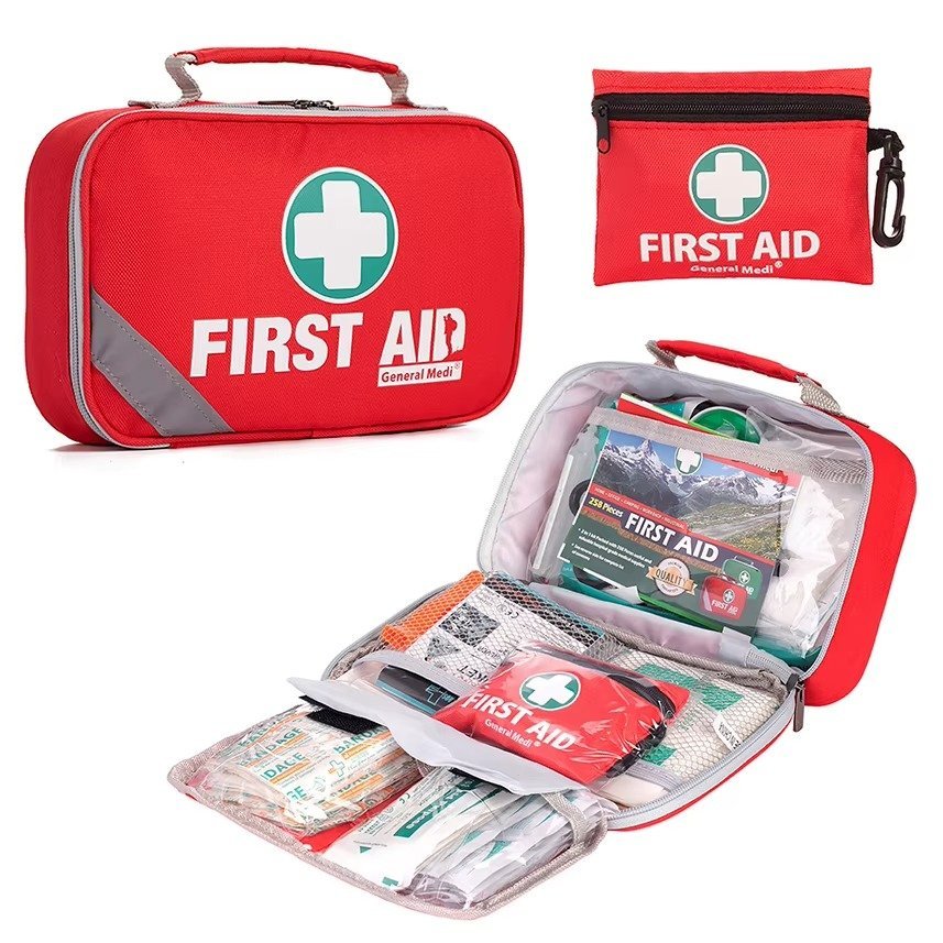 Custom 258-Piece First Aid Kit - red compact first aid bag, closed, white background